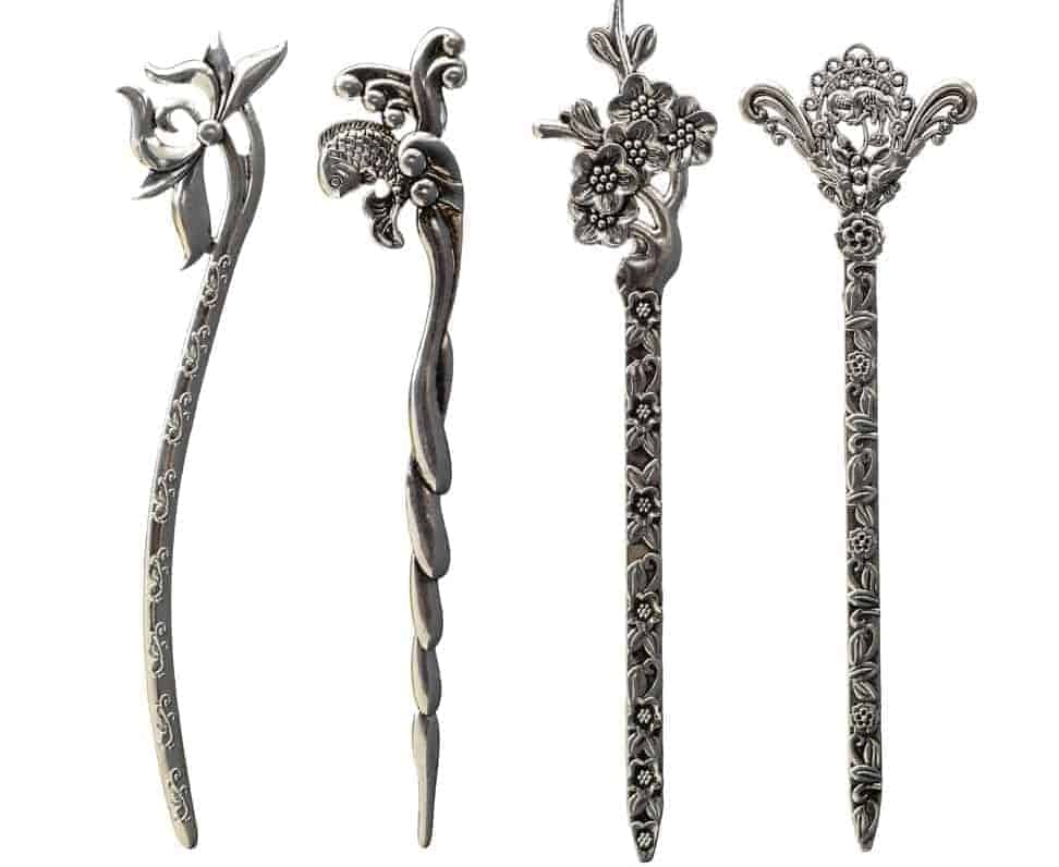 A set of decorative metal hairpins.