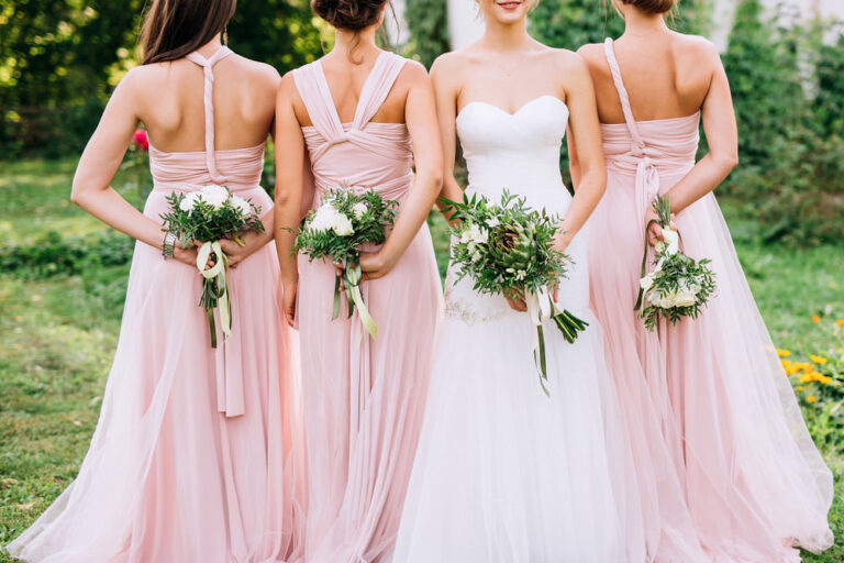 Bridesmaids wearing infinite dresses