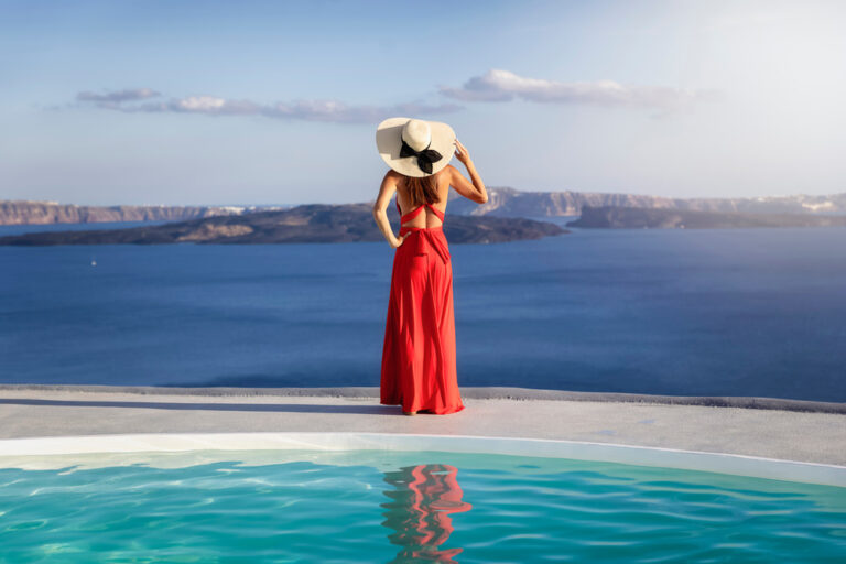 Woman wearing convertible dress on the beach