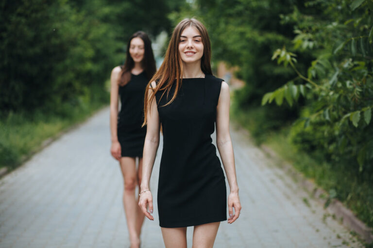 Young woman wearing a little black dress