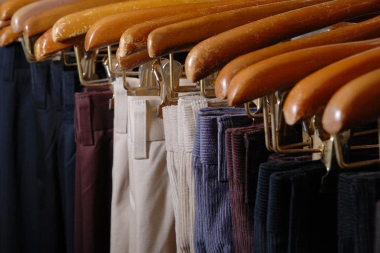 different pants that are hanged