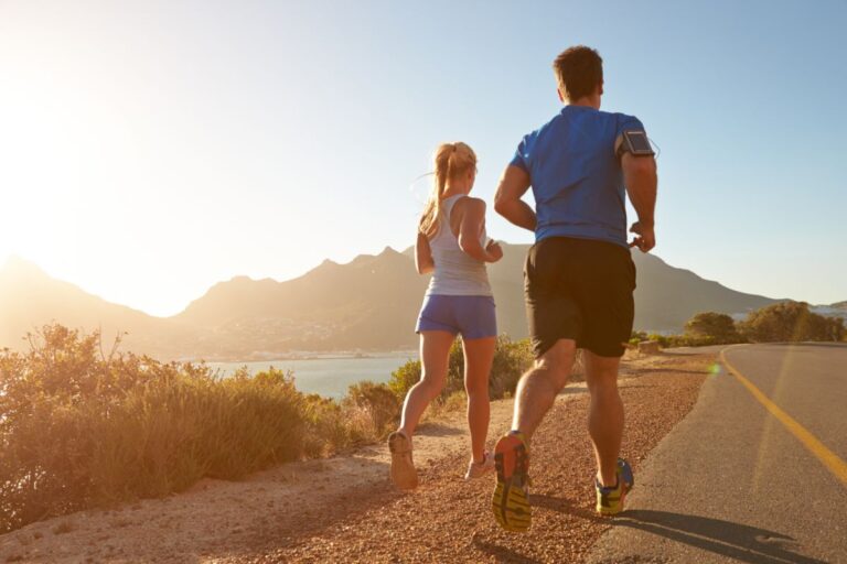 Man and woman running early in the morning.