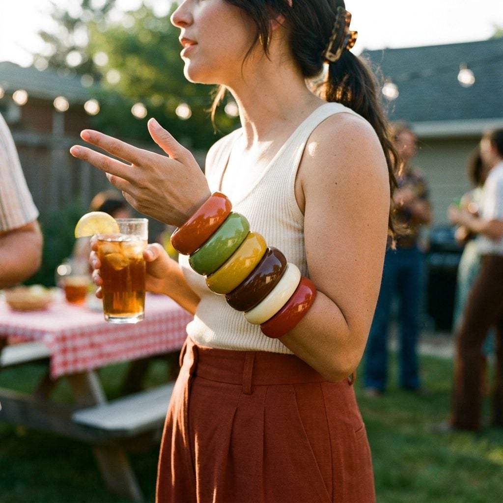 A Pair of Oversized Plastic Bangles Clacking Through the Entire Afternoon