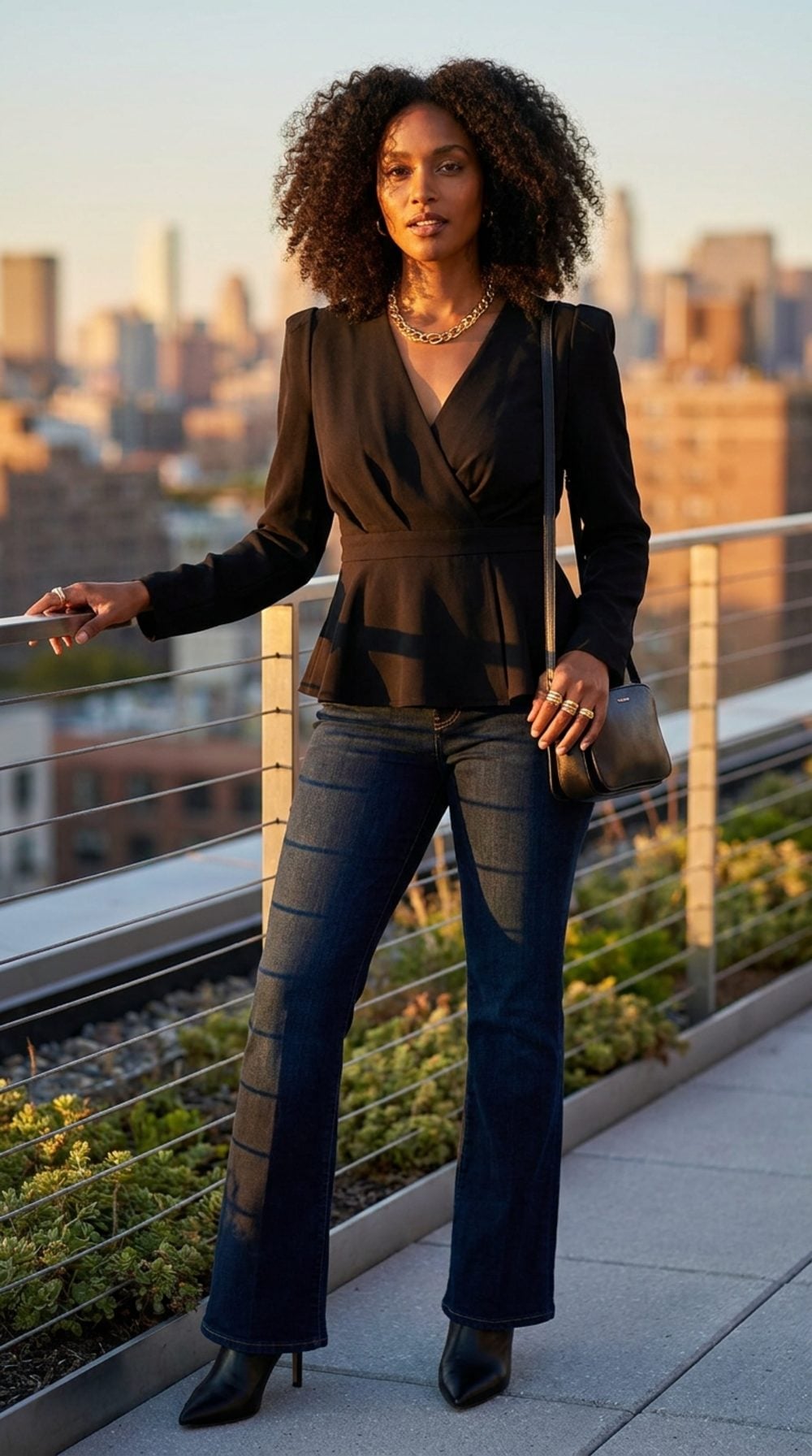 Black Wrap Peplum on a Rooftop: Evening Edge With Flared Denim Below