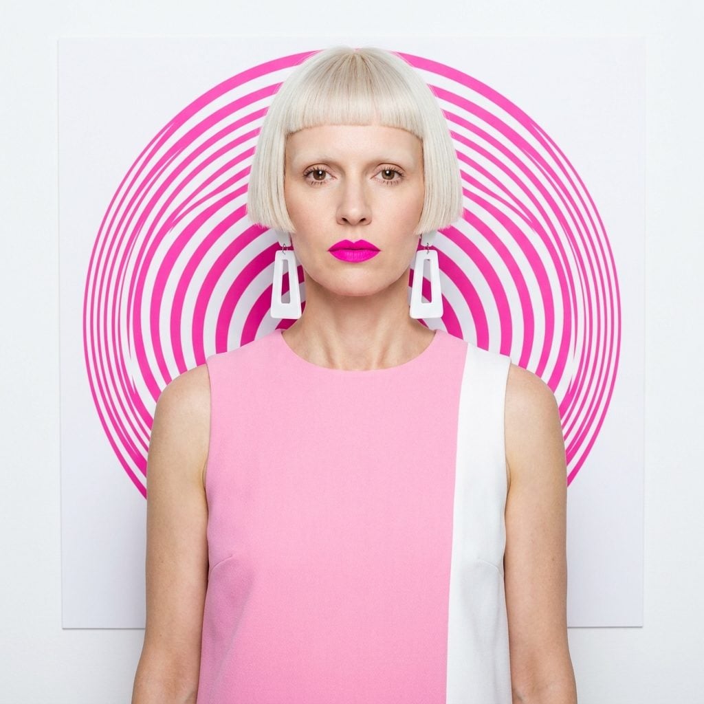 Hot Pink Matte Lips With Barely Any Eye Makeup and Bleached-Out Pale Brows