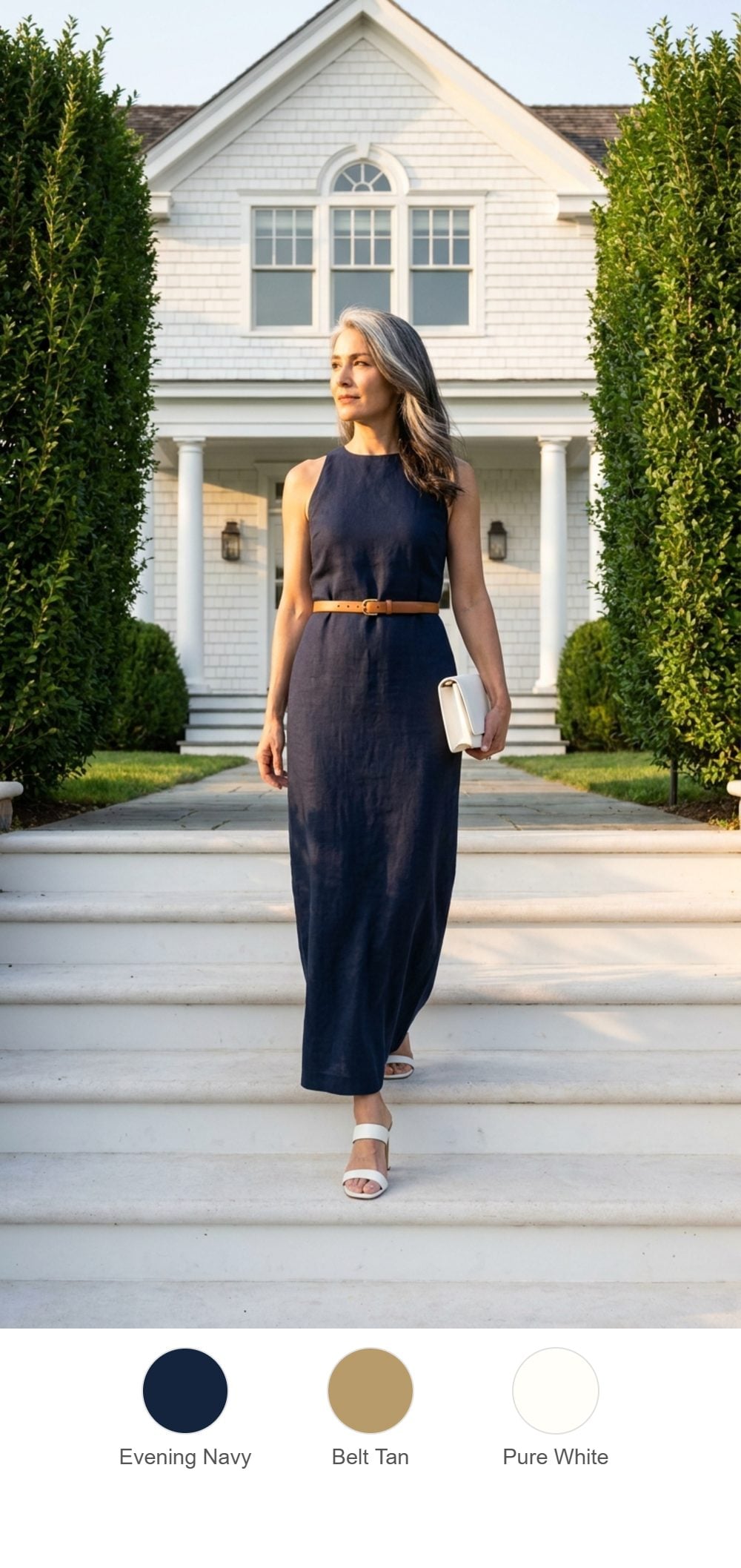 A Navy Column Dress Descending White Steps at Golden Hour