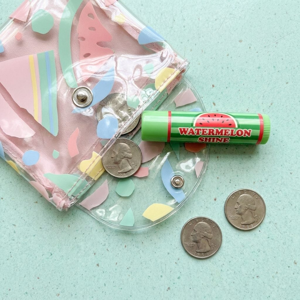 The Clear Plastic Coin Purse That Held Exactly One Lip Smacker and Seventy-Five Cents