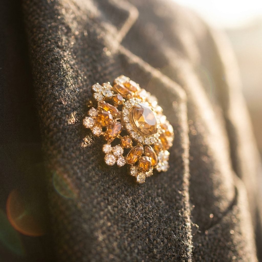 The Costume Jewelry Brooch Pinned Exactly on the Lapel
