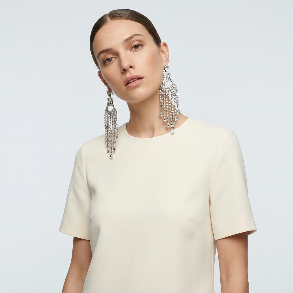 Chandelier Earrings That Swallow a Minimalist Dress