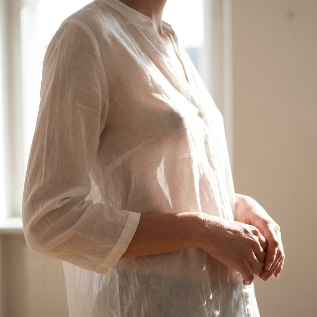 The Slightly Sheer White Blouse That Gives Away the Game