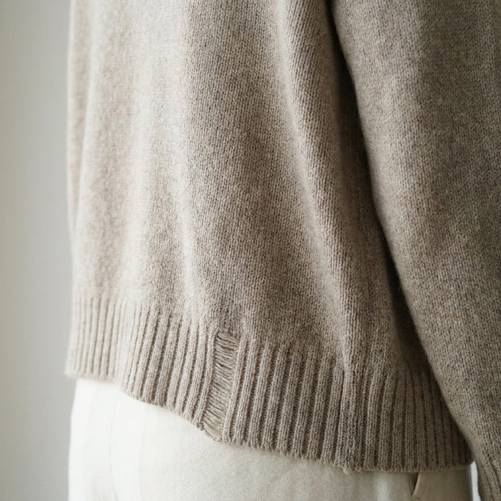 The Stretched, Shapeless Cardigan That Reads as Tired, Not Refined