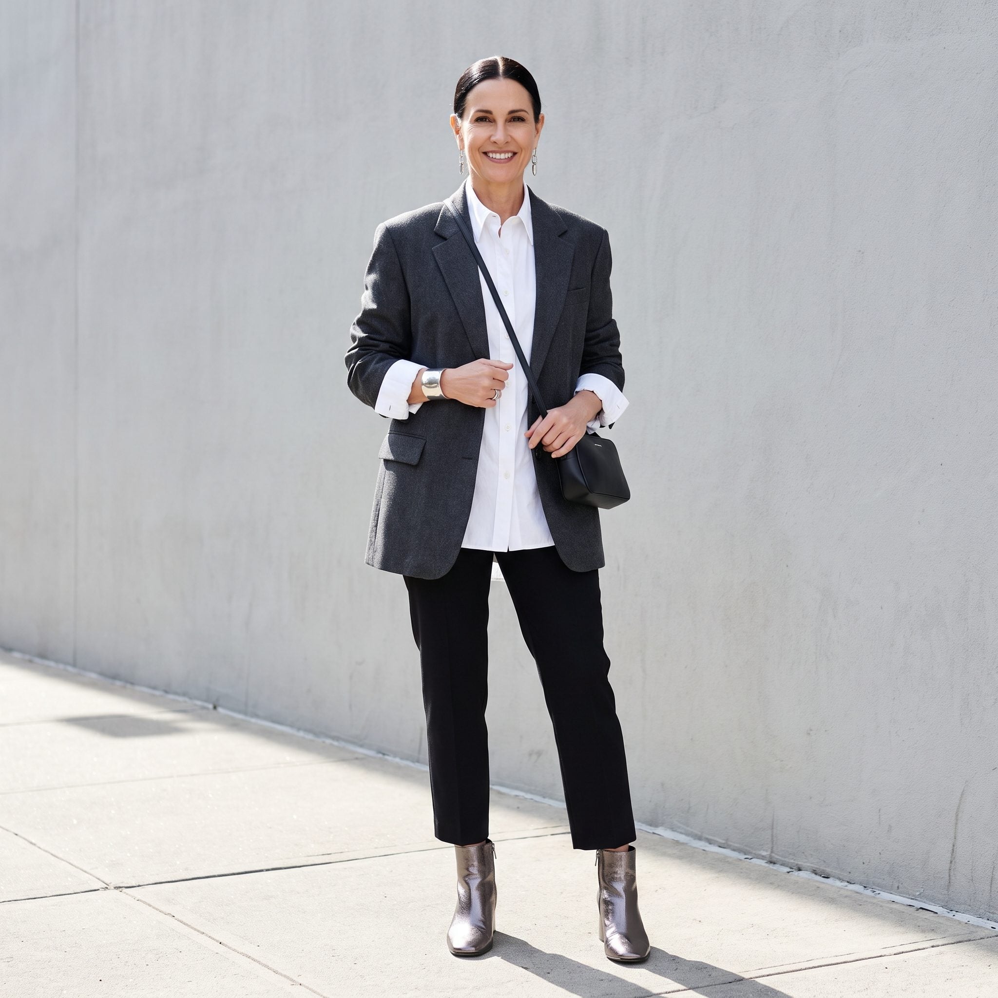 Slim cropped trousers styled with pewter metallic ankle boots
