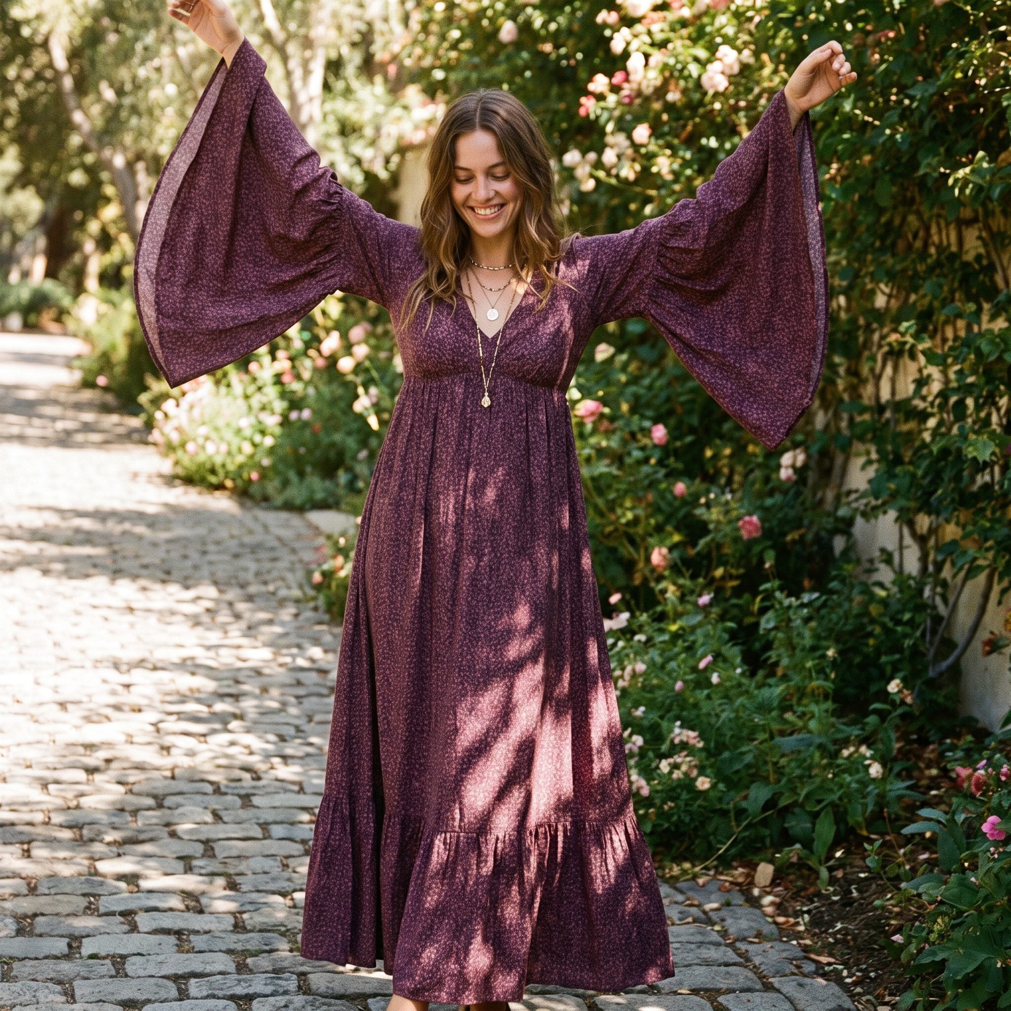 1970s deep-plum maxi gown with dramatic bell sleeves