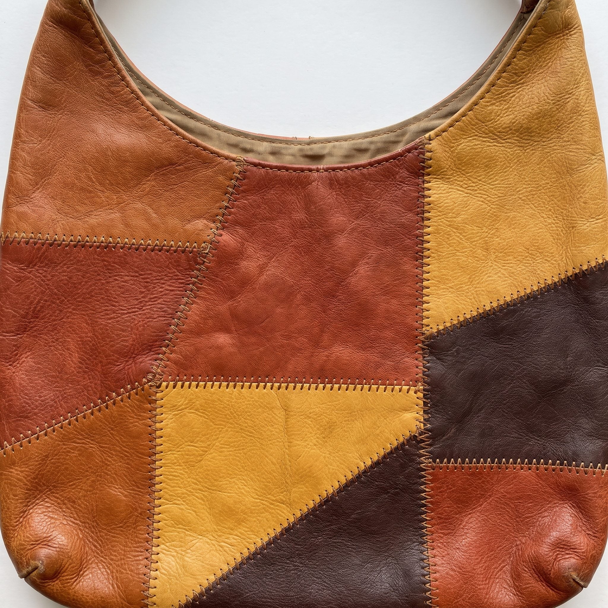 1970s geometric patchwork leather handbag in brown and mustard