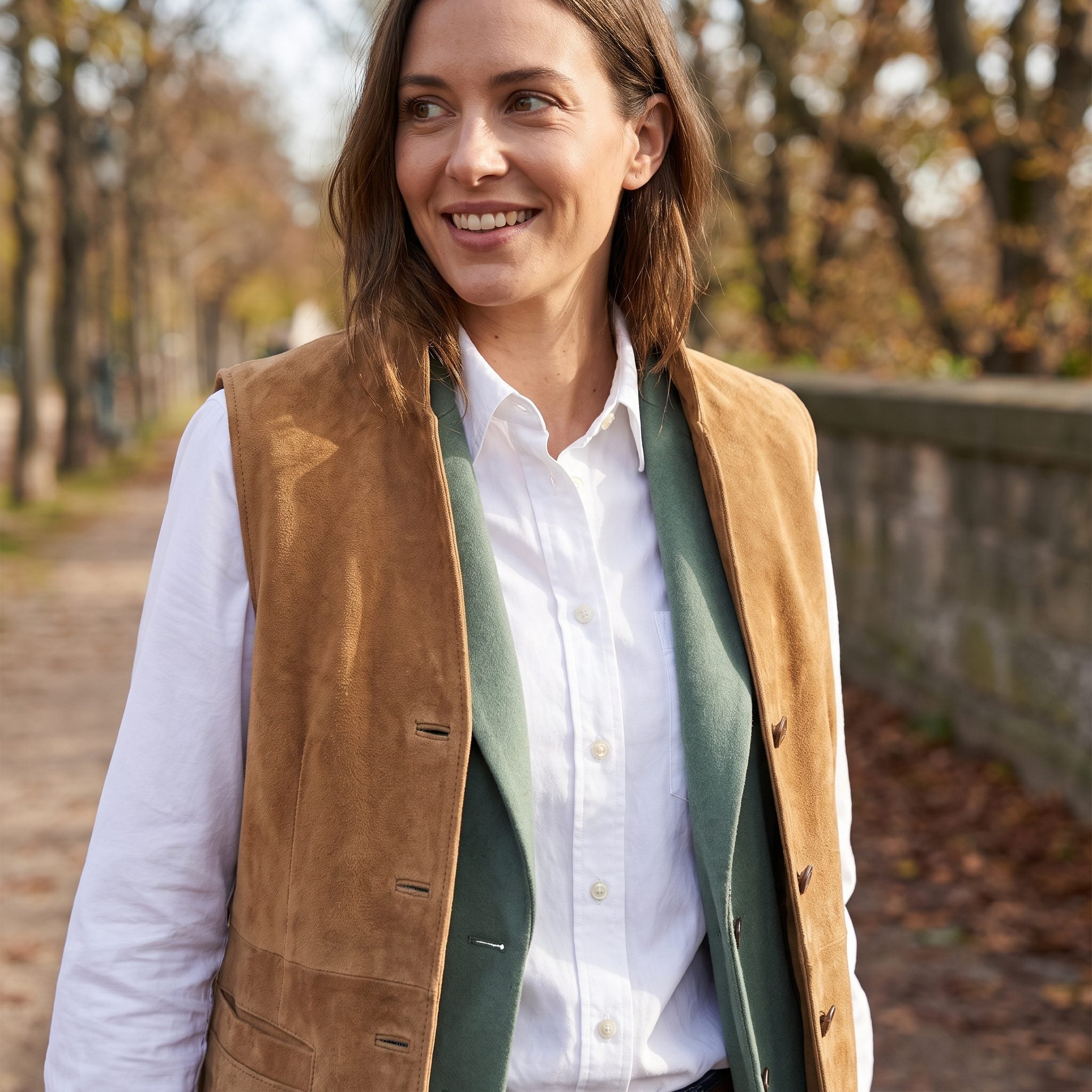 1975 white shirt under a camel suede vest