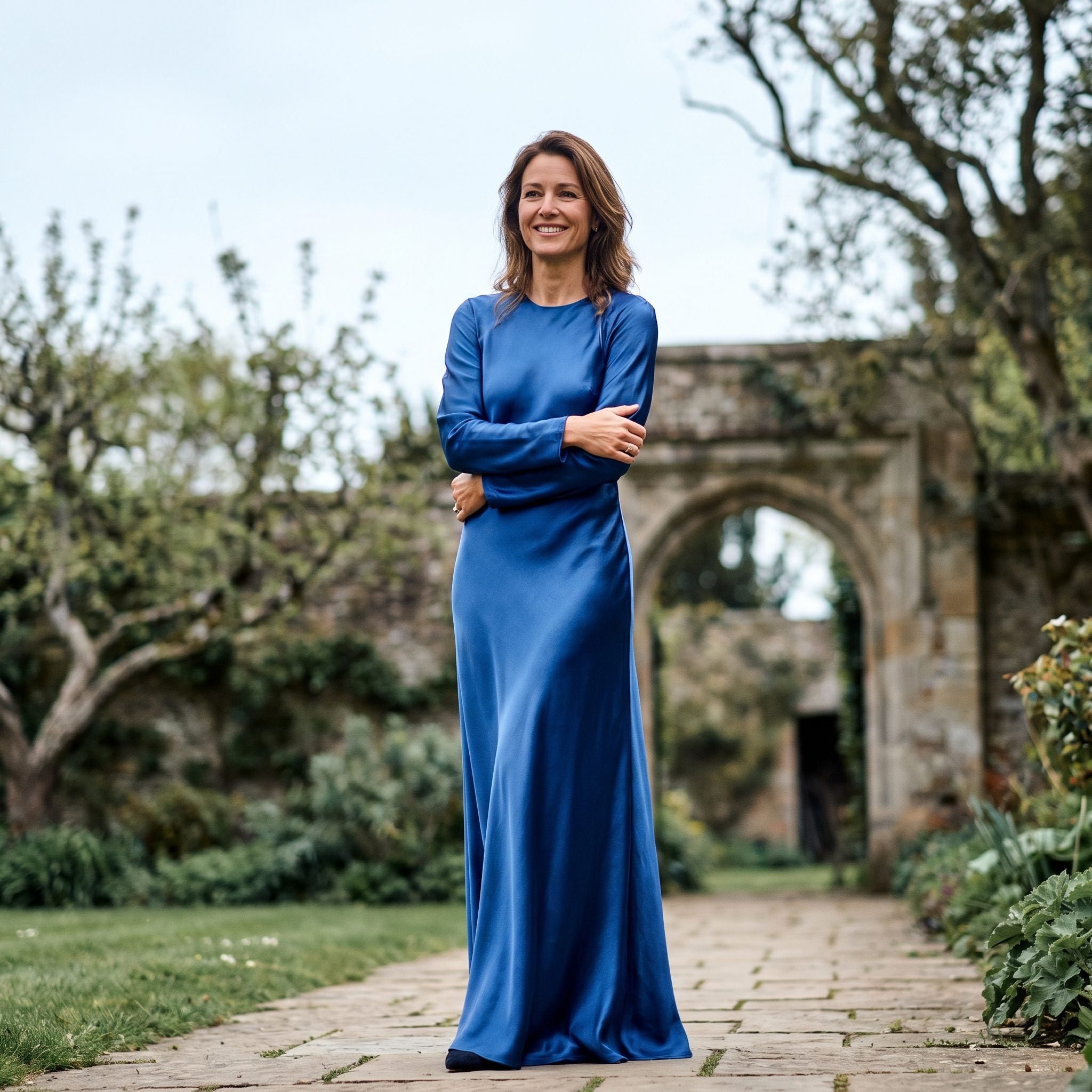 1980s sapphire-blue satin formal gown with sweetheart bodice