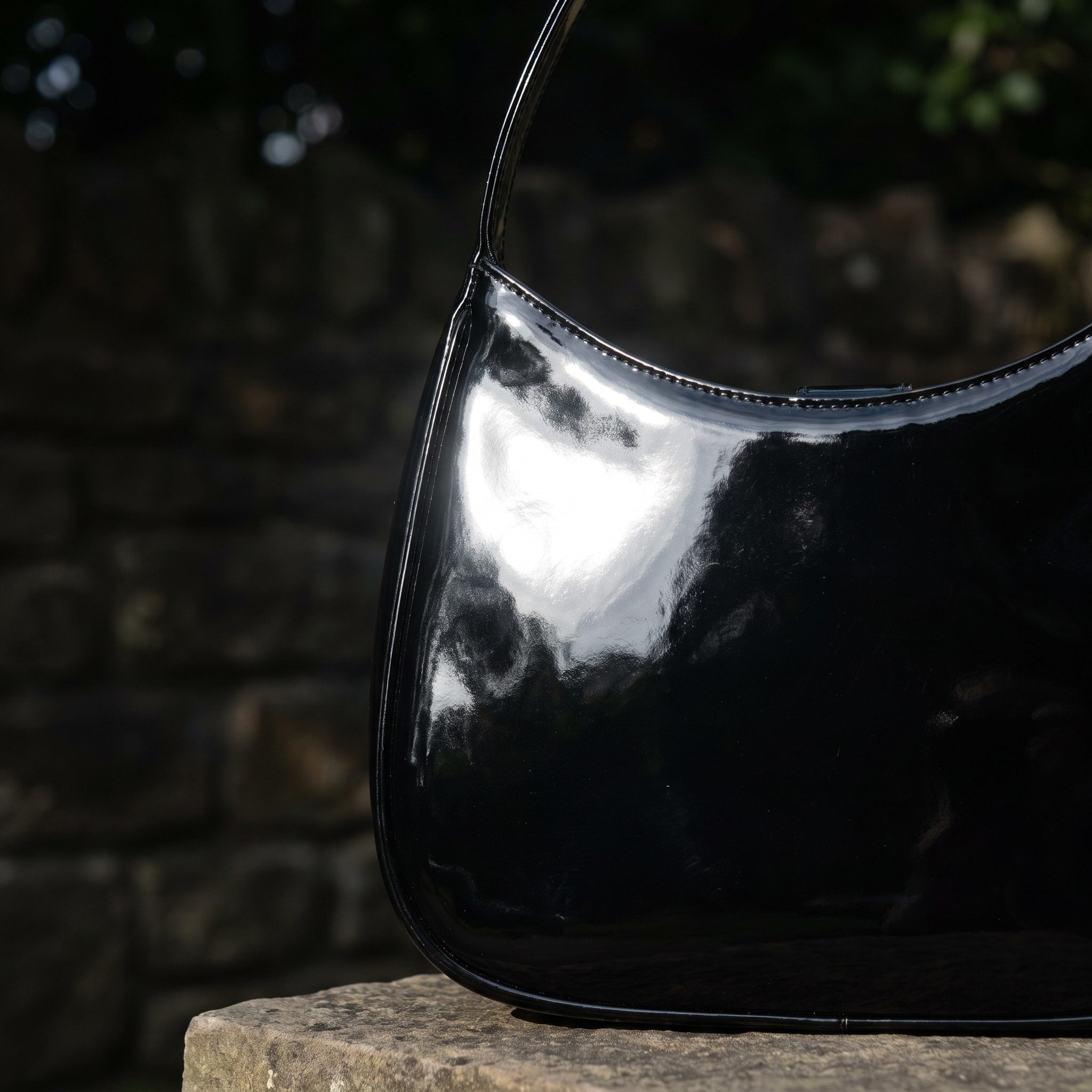 1980s glossy black patent leather handbag