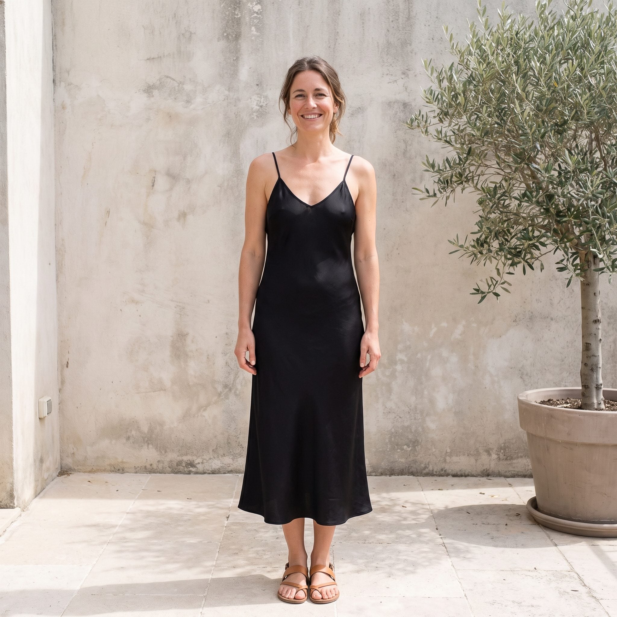 1990s simple black satin slip dress with spaghetti straps