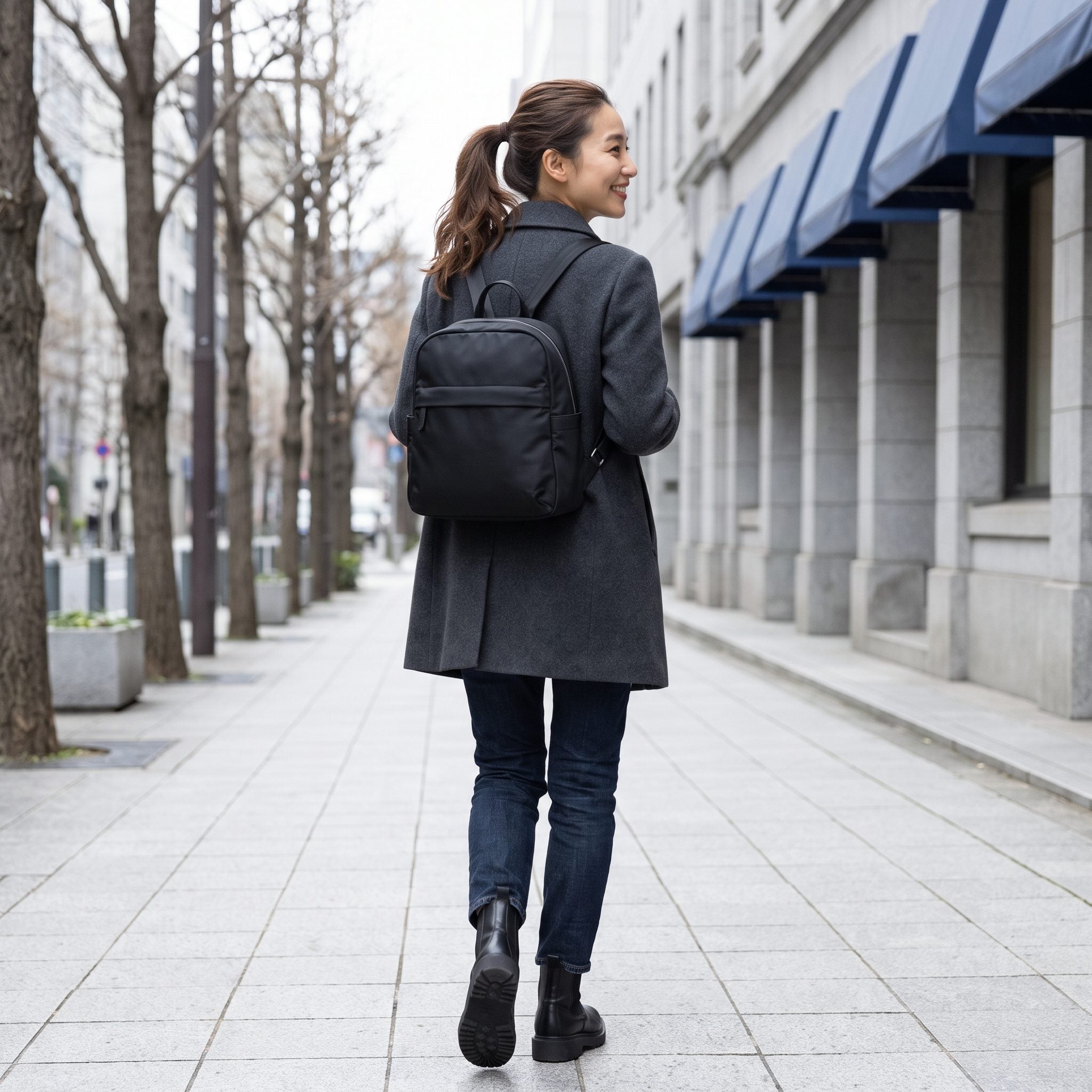 1990s black nylon backpack purse with casual outfit