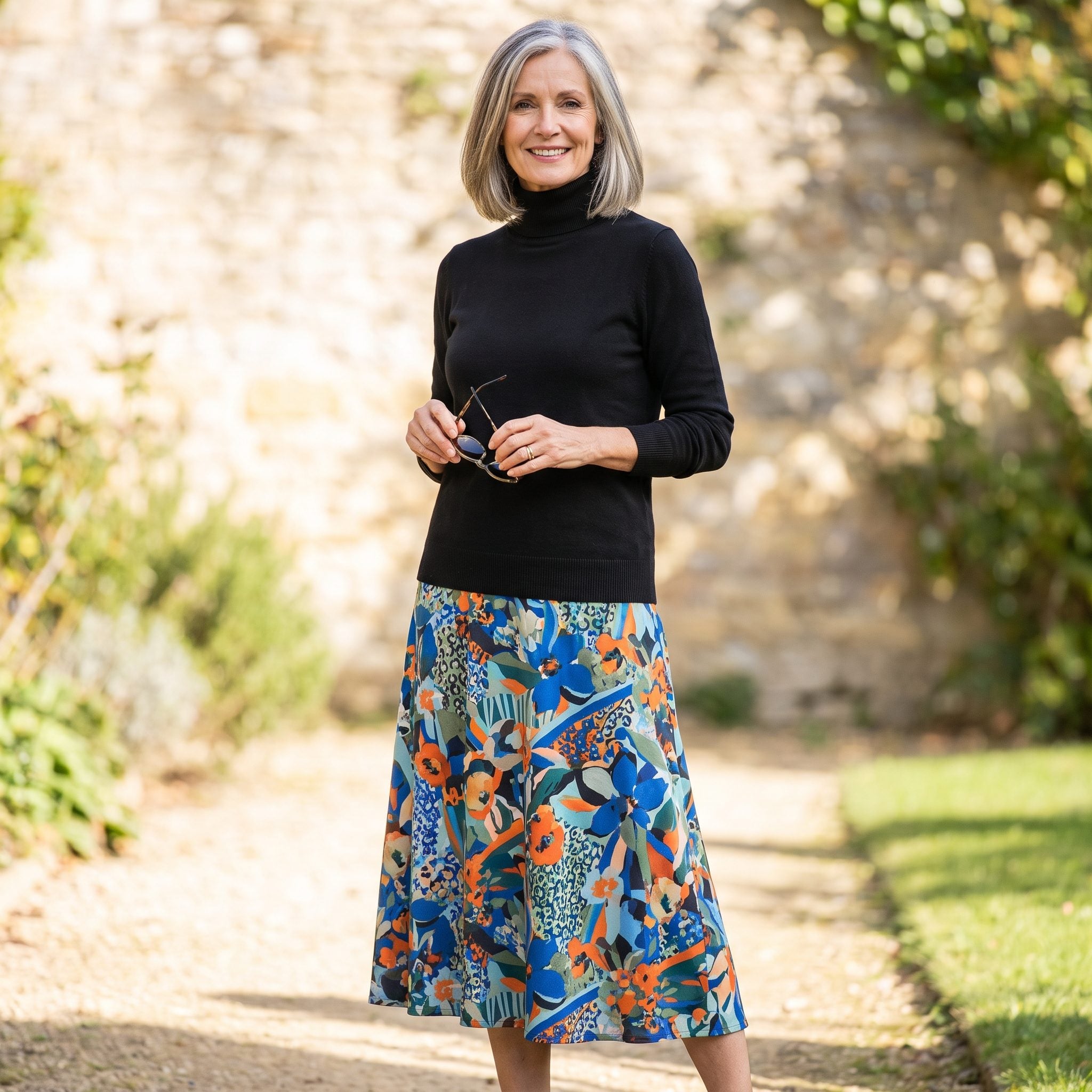 Black Turtleneck With a Bold Printed Midi Skirt