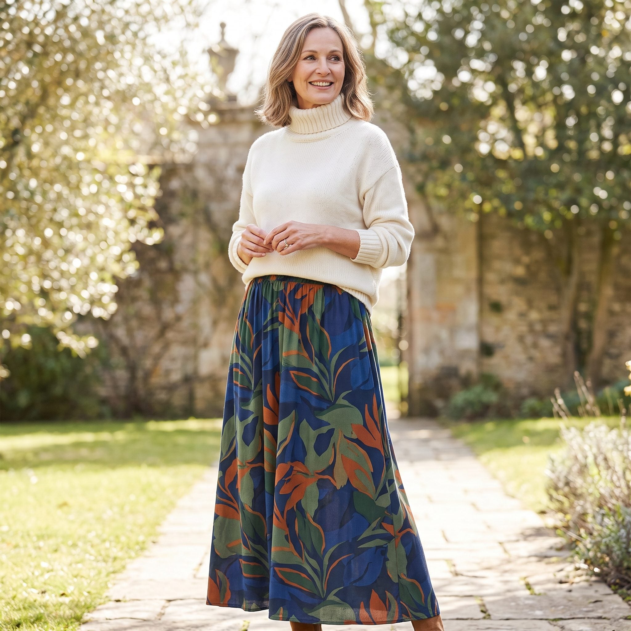 Cream Turtleneck With a Large-Scale Printed Skirt