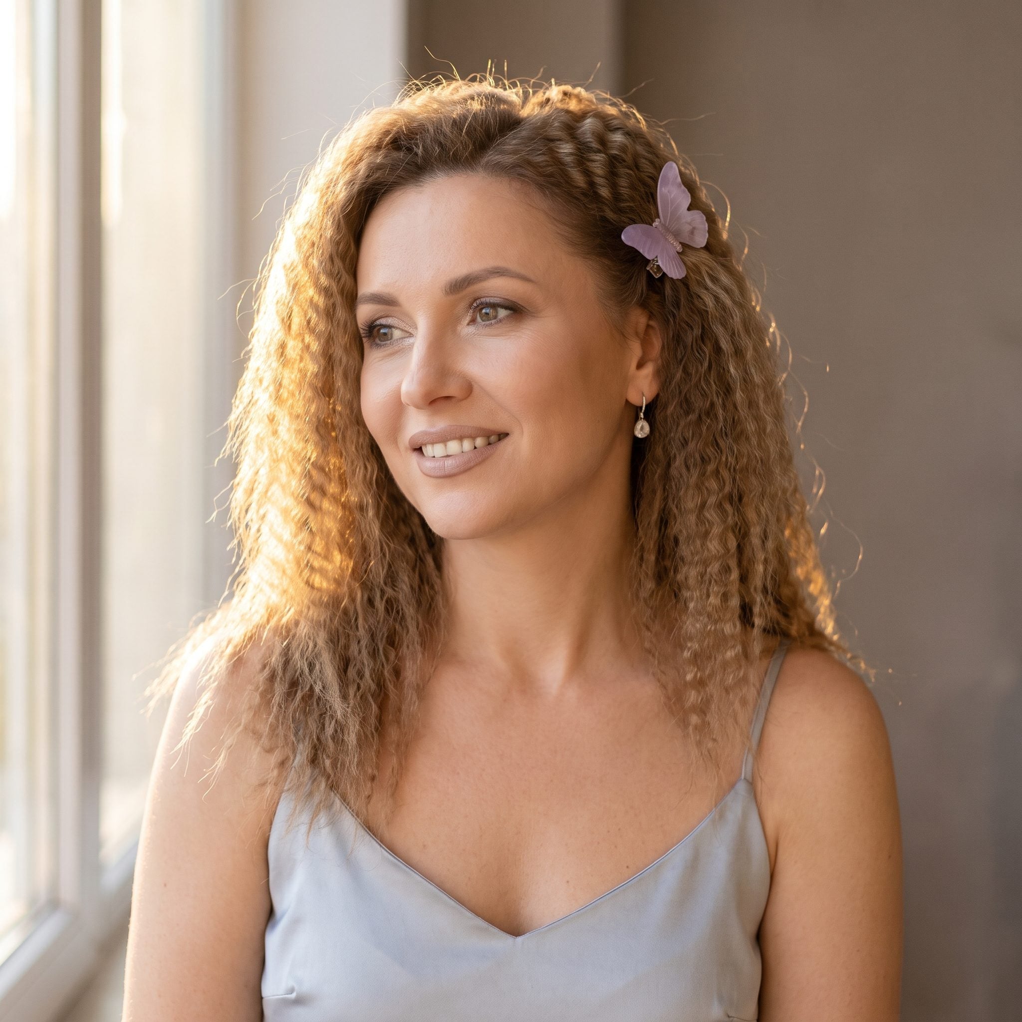 Crimped Hair Held Back With a Single Butterfly Clip
