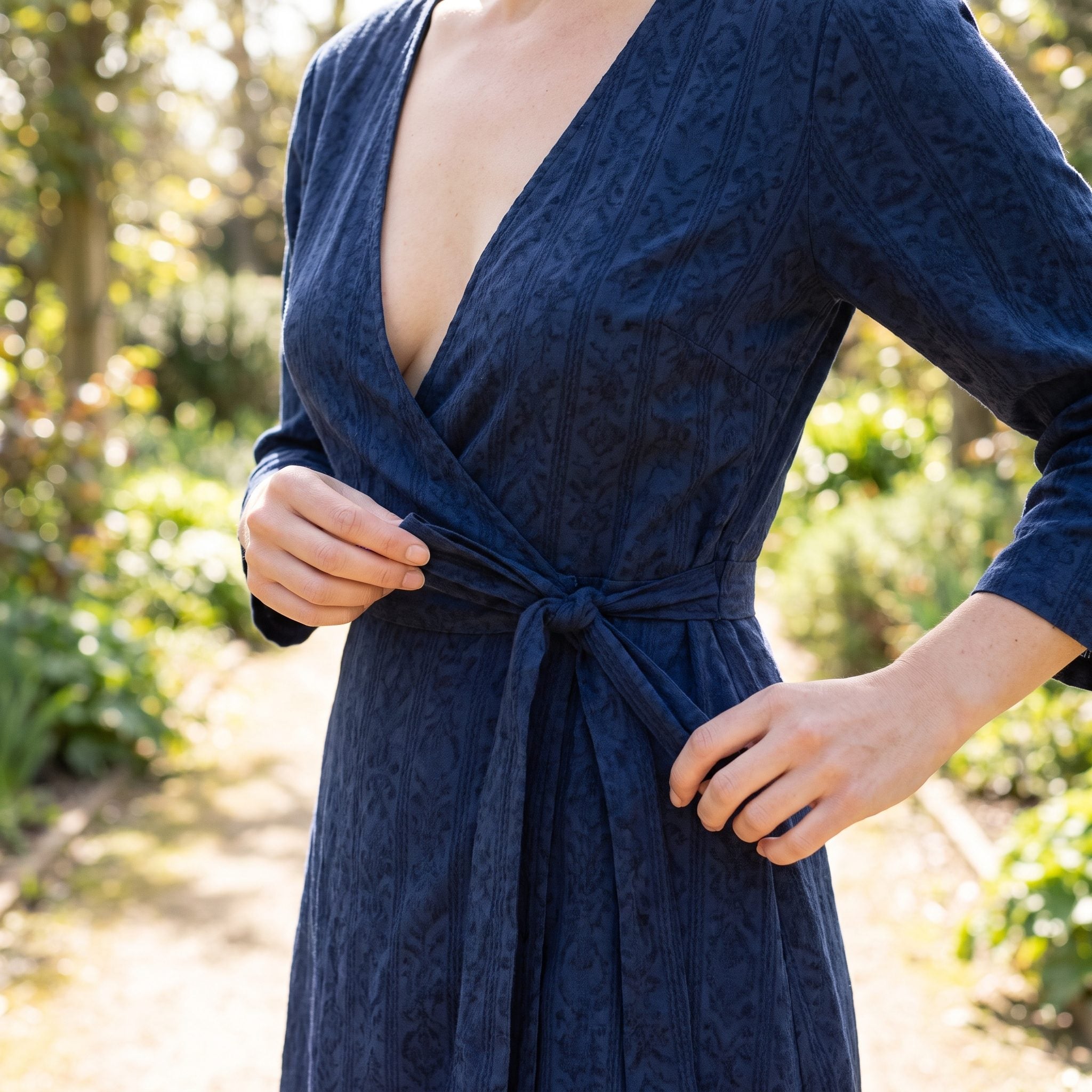 The Deep V-Neck Wrap Dress That Never Stays Wrapped