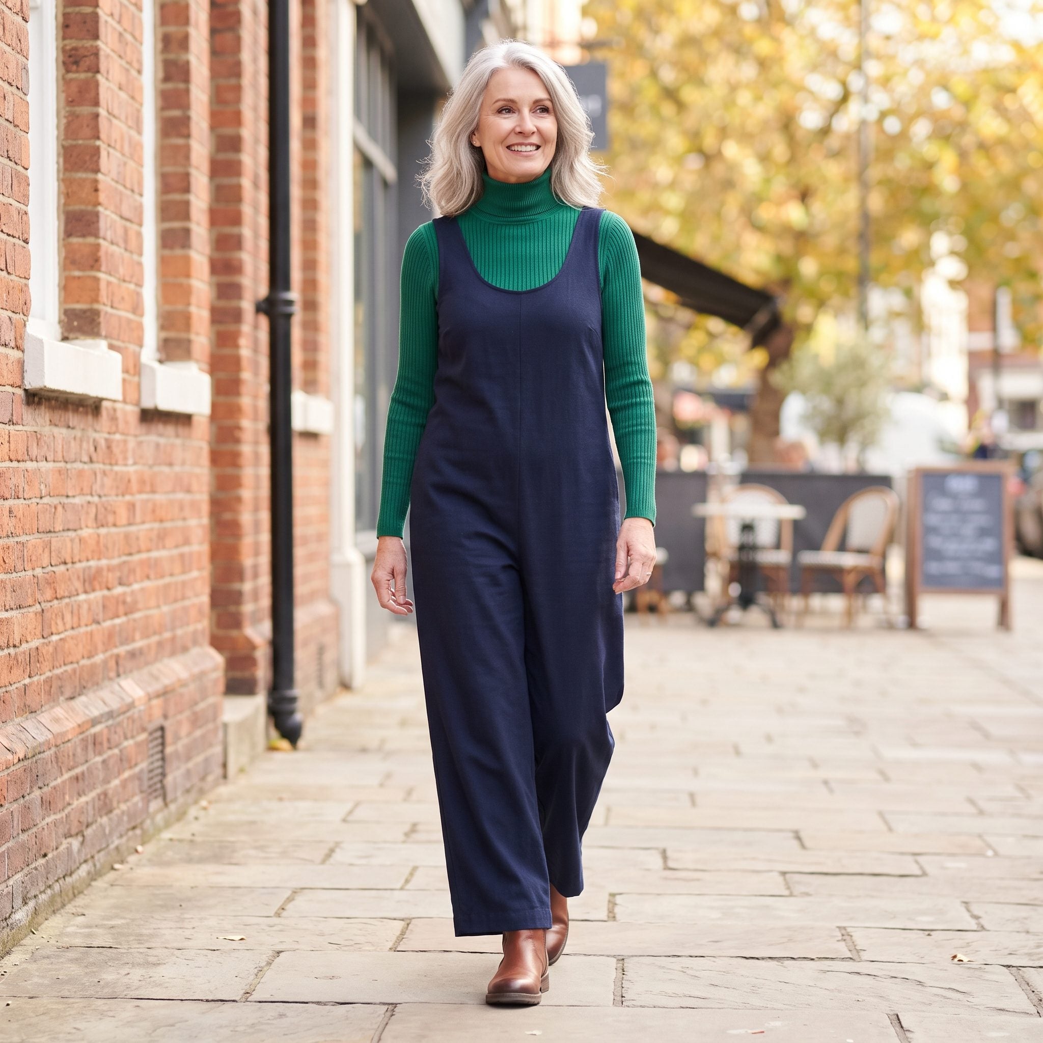 Emerald Turtleneck Under a Navy Jumpsuit