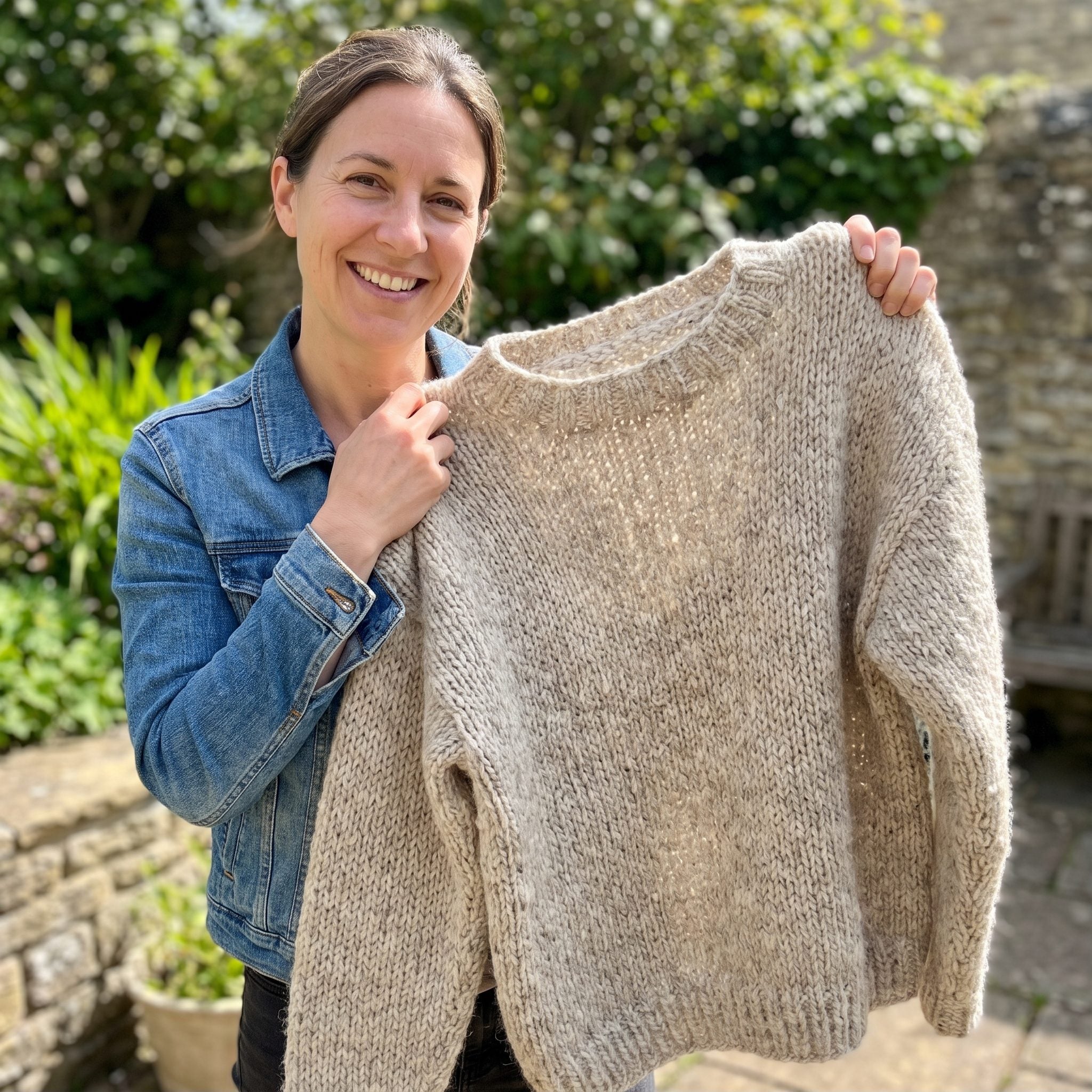 Chunky oatmeal wool sweater with a high neckline