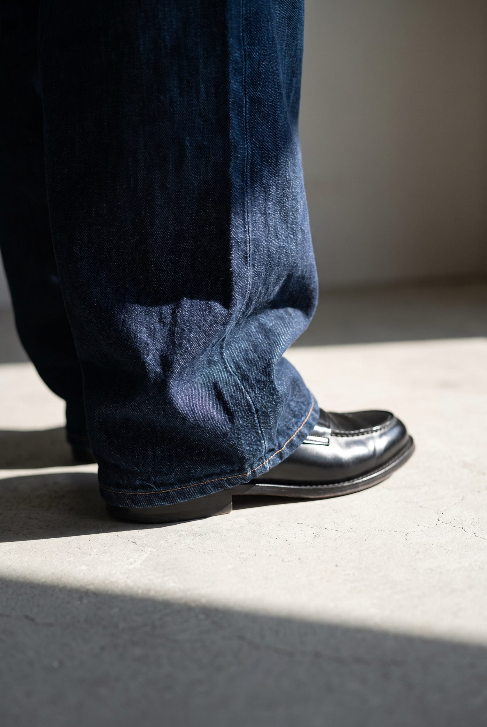Puddle-Hem Wide-Leg Jeans Swallowing Sleek Leather Loafers