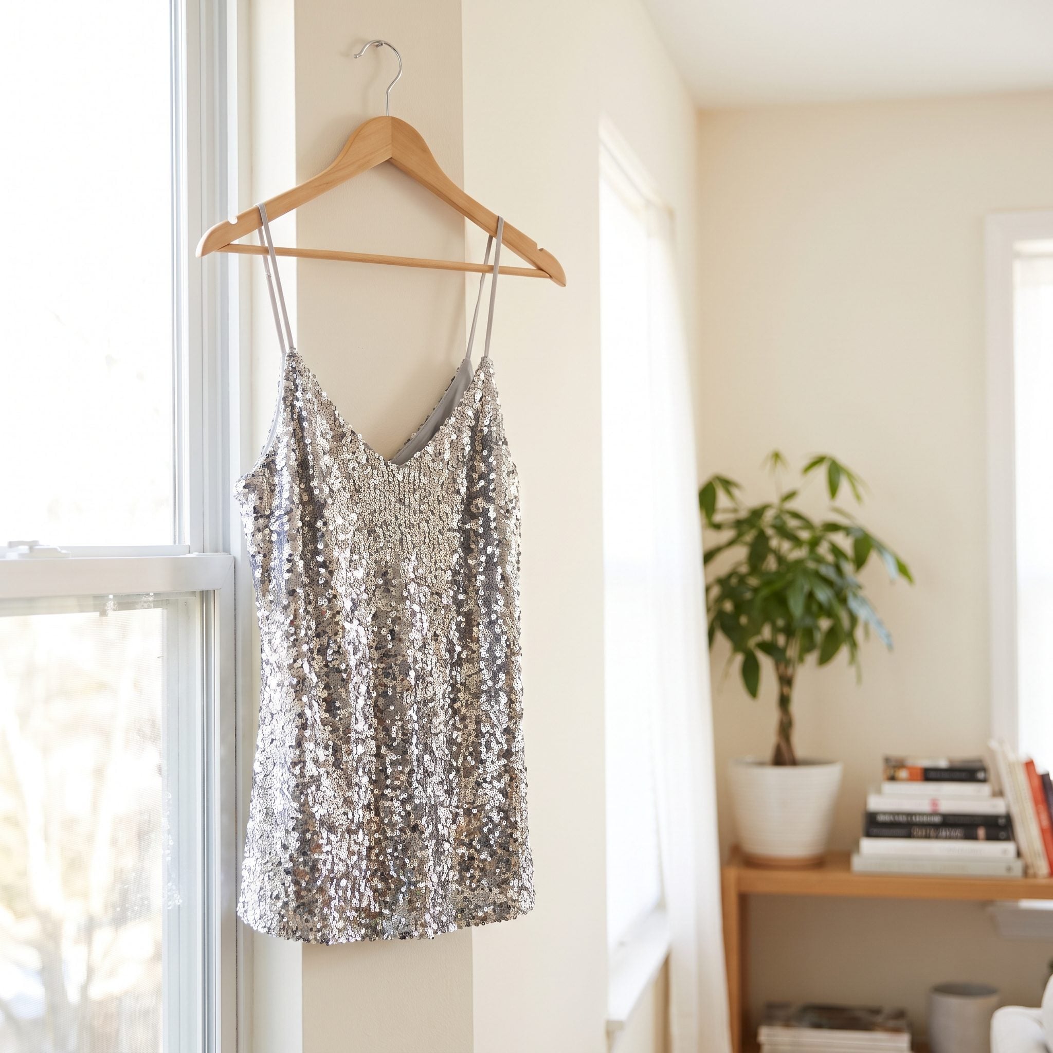 Silver sequin top styled with black tailored trousers