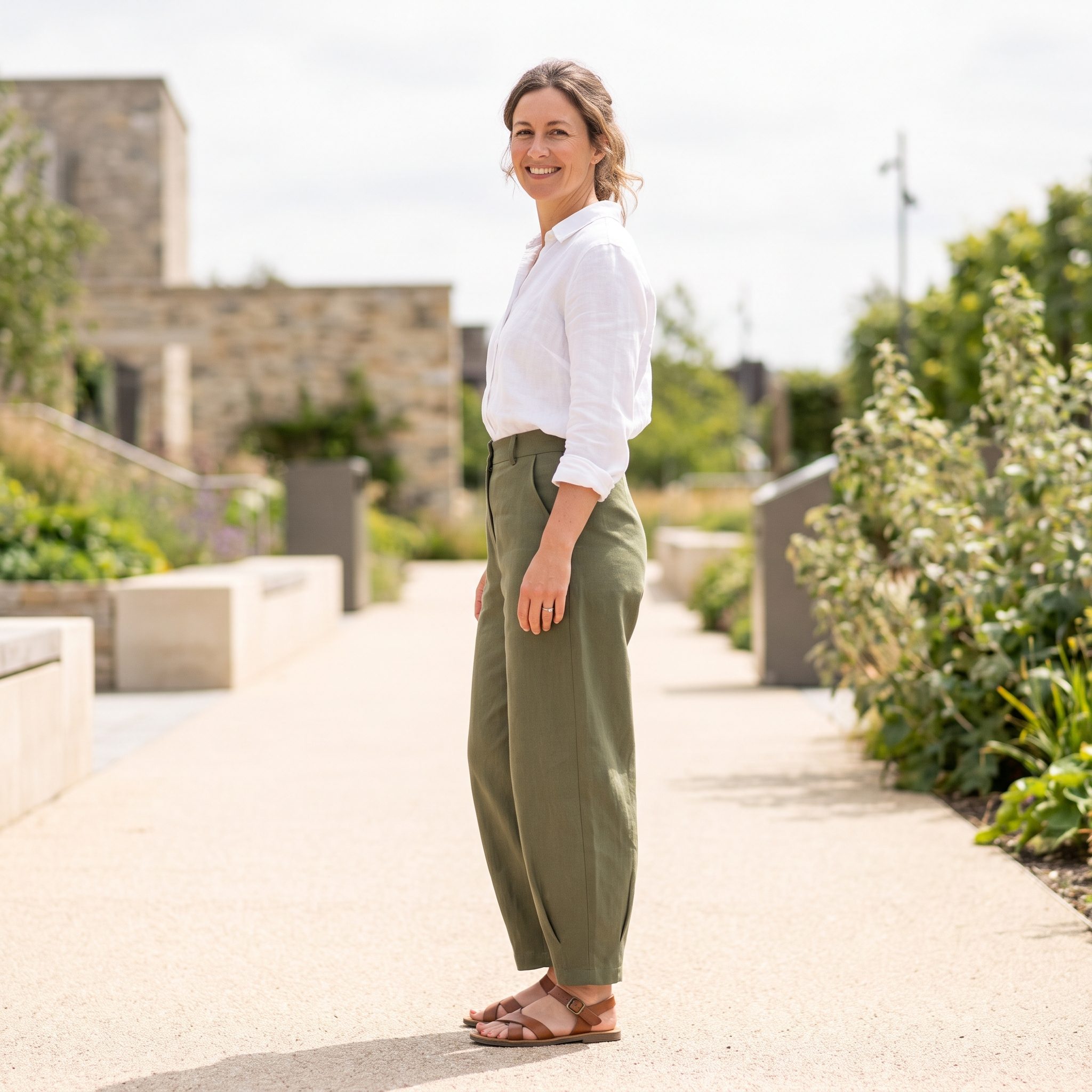 Contemporary white shirt with olive barrel-leg trousers
