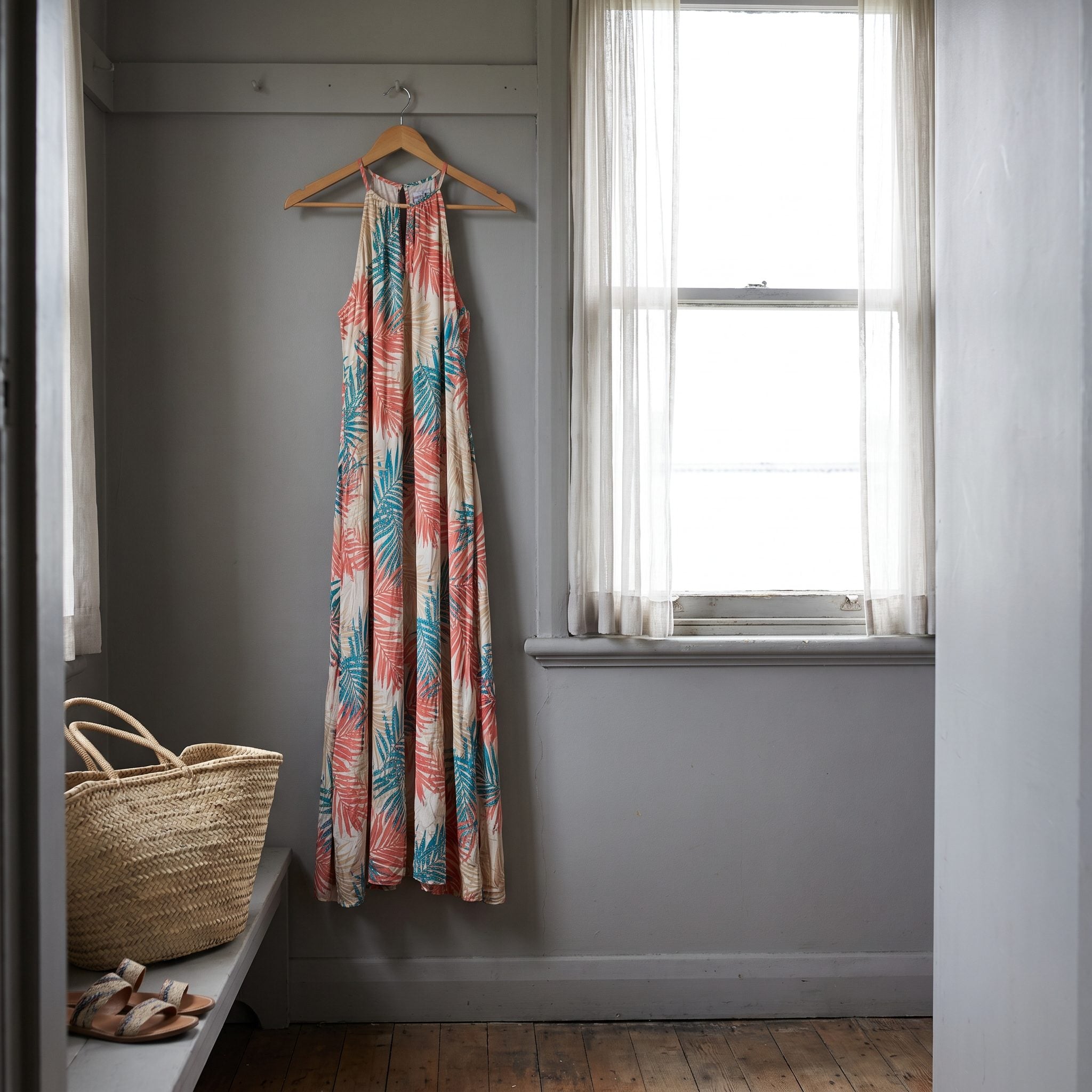 Colorful coral-and-teal palm-print halter maxi dress