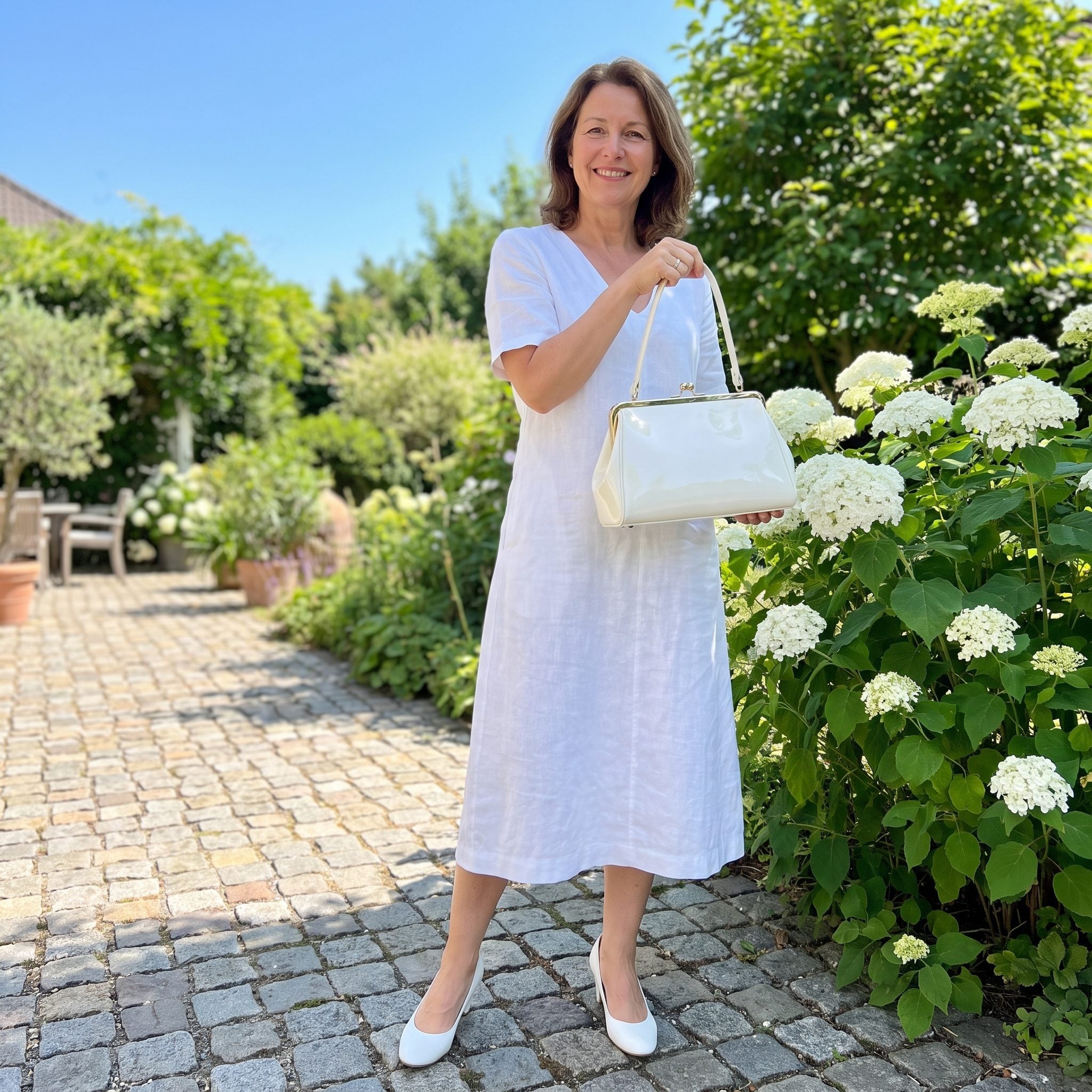 White Pumps + White Frame Handbag