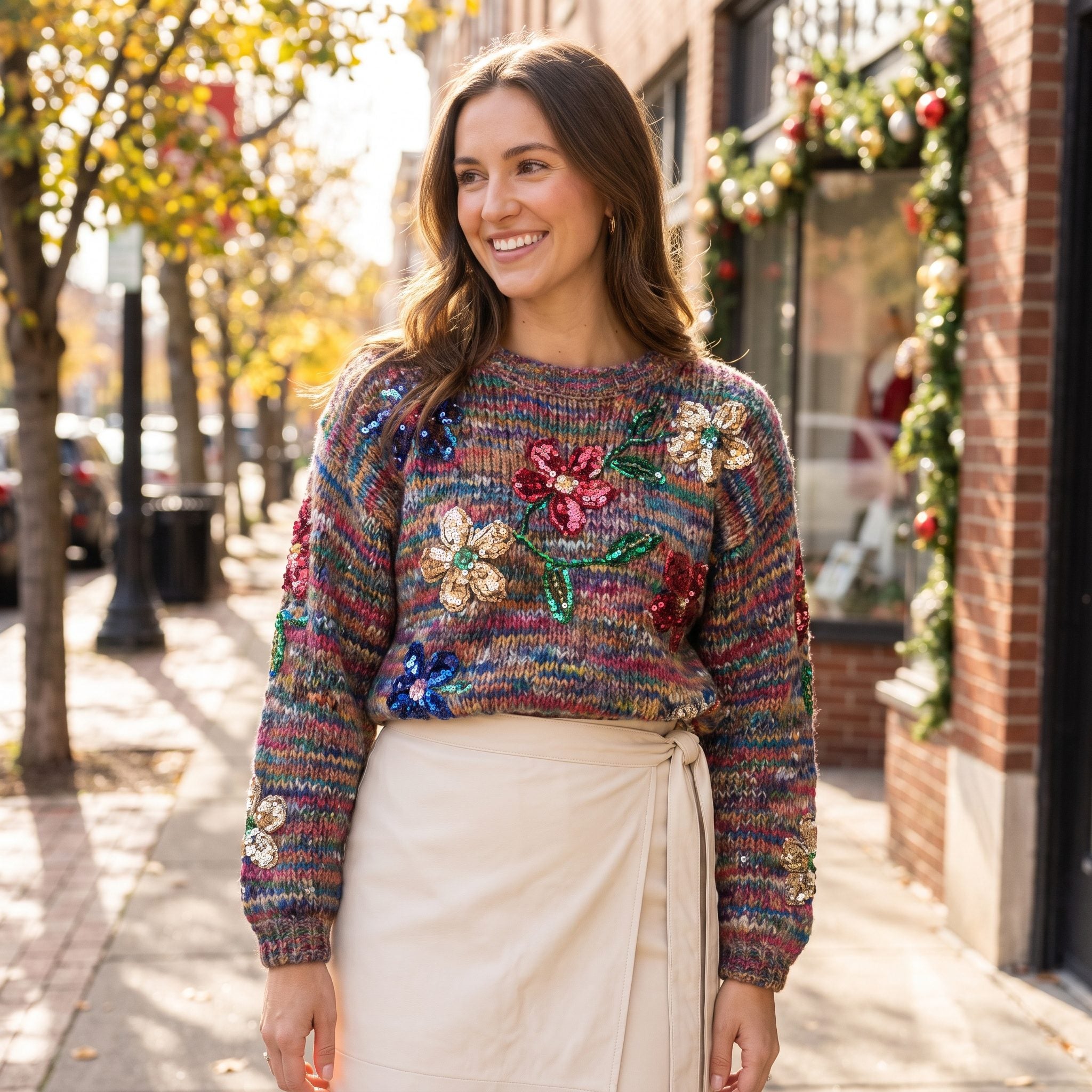 Navy beaded holiday sweater worn with a cream wool wrap skirt and matching slingbacks