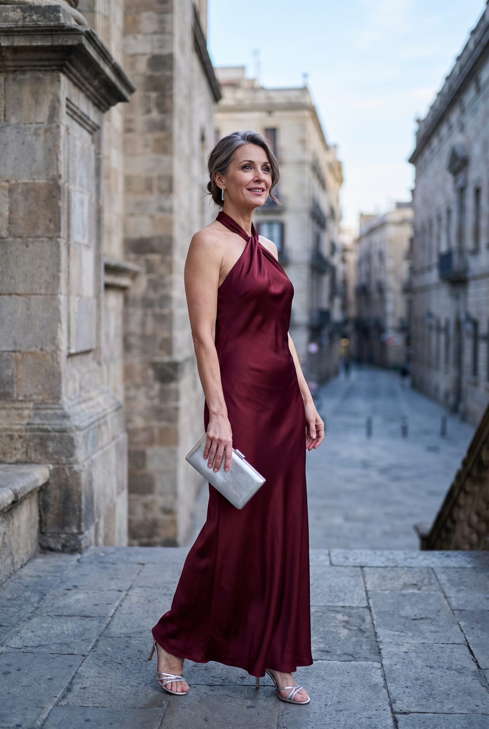 Garnet Halter Dress With a Brushed-Silver Clutch