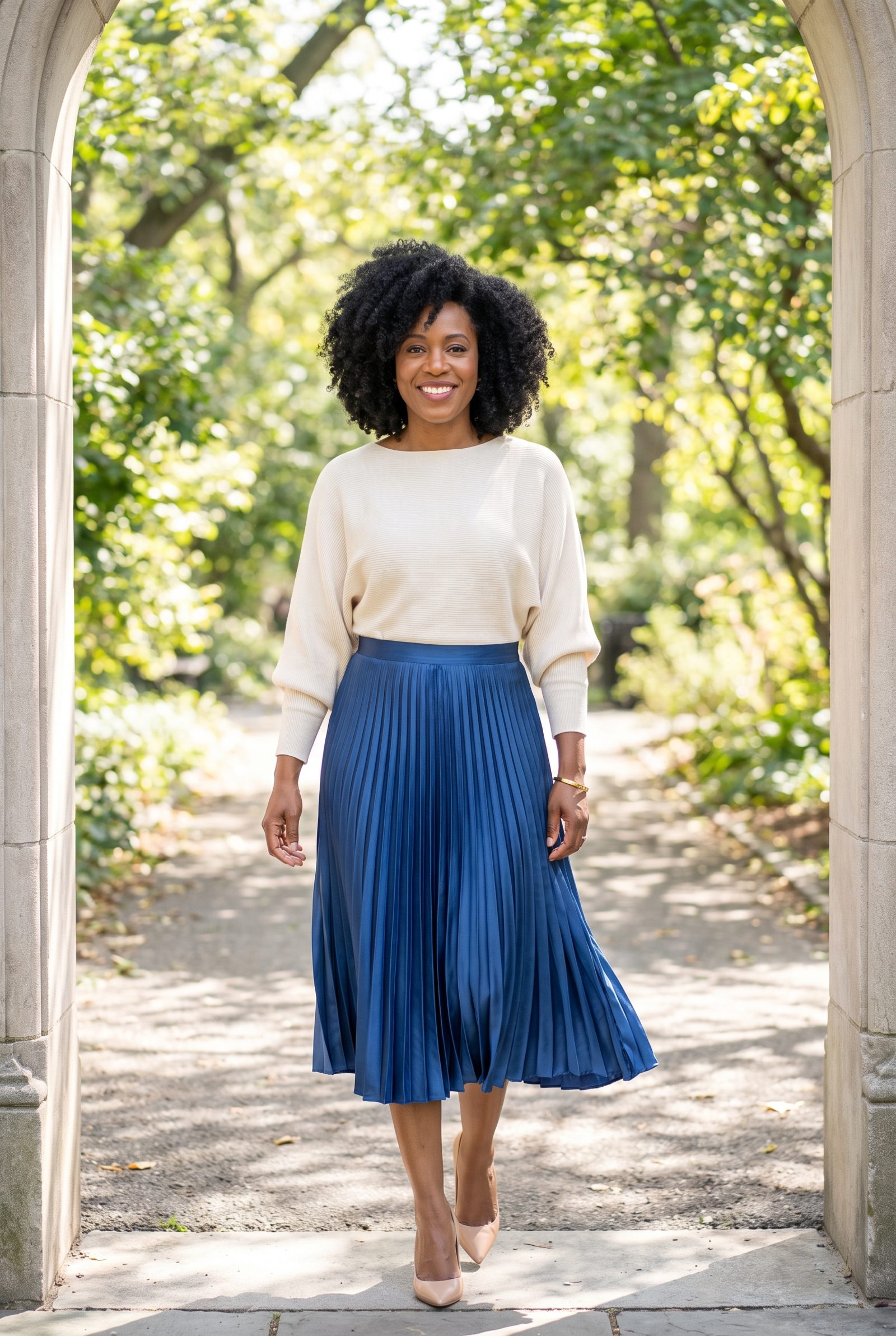 Ivory Dolman Knit With a Sapphire Pleated Skirt