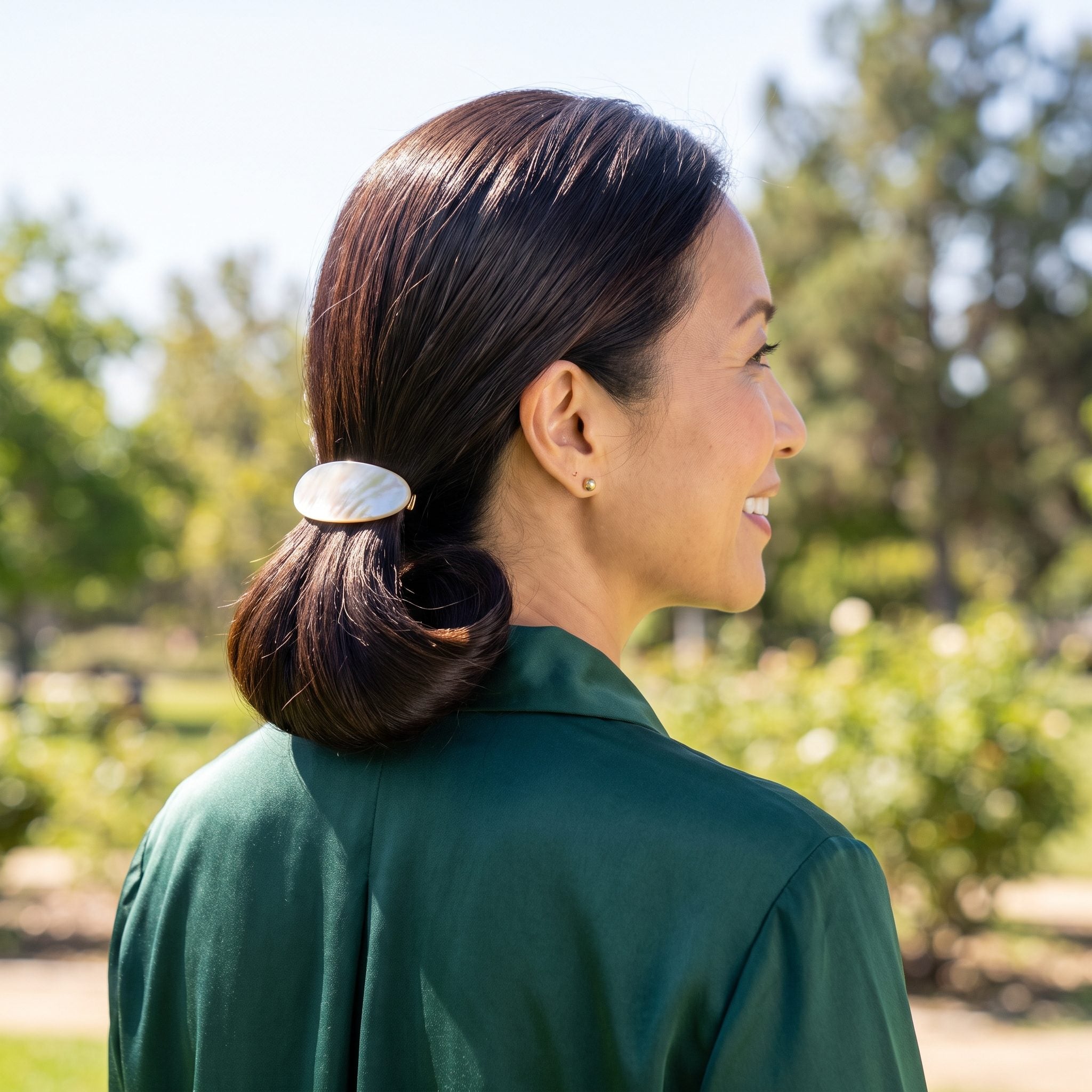 Low Looped Ponytail With an Oval Barrette