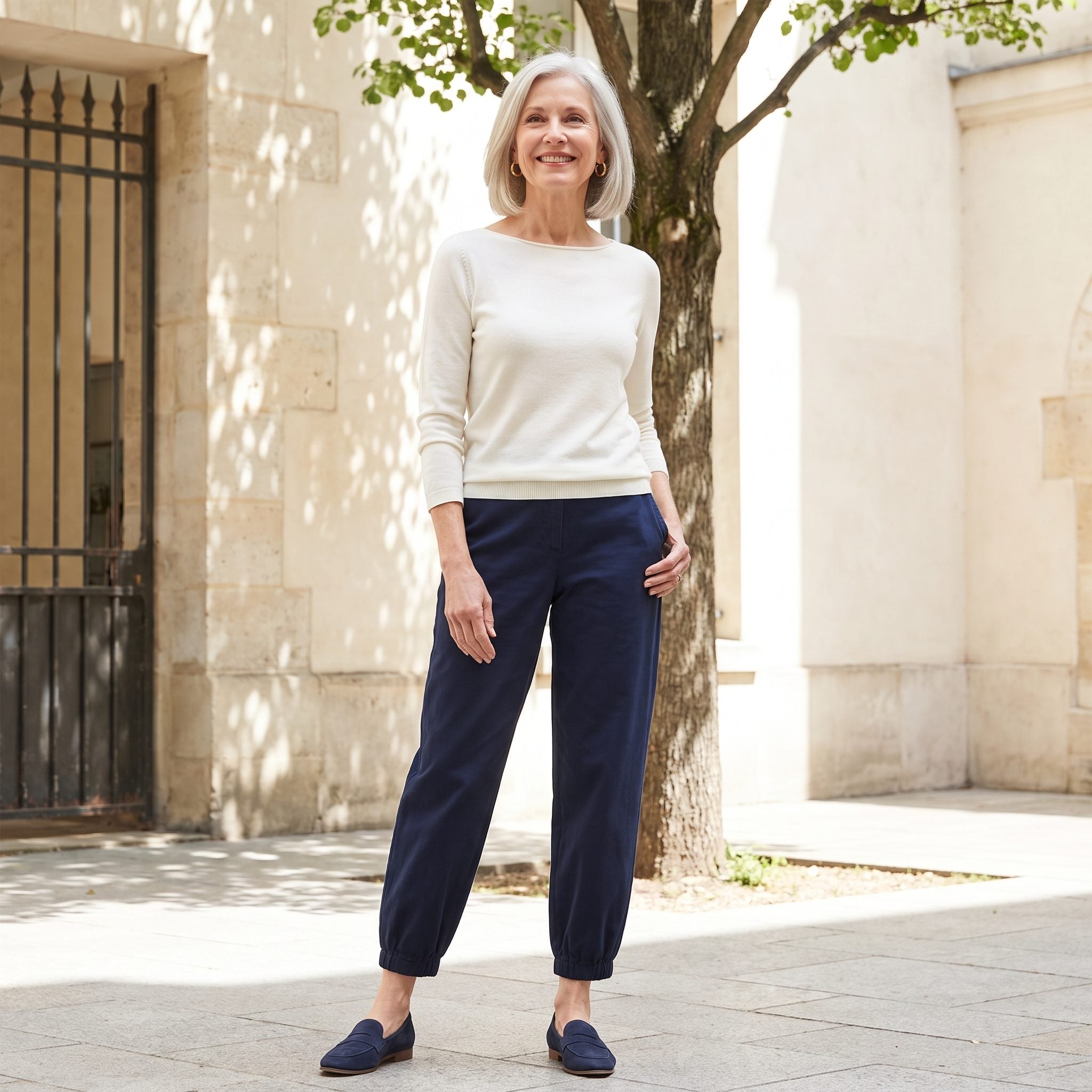 Paris, An Ivory Boatneck Knit With Navy Barrel-Leg Trousers