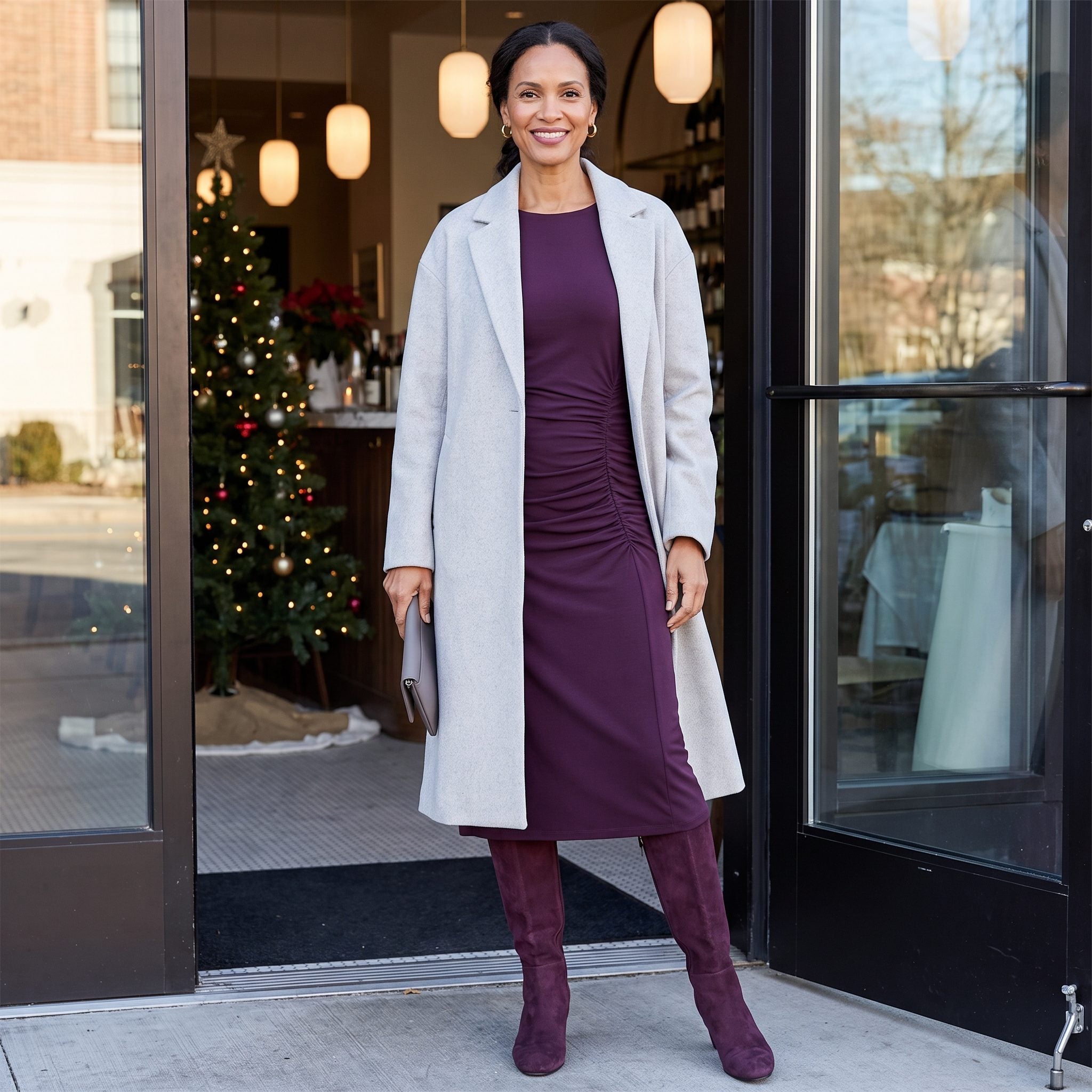 Pearl-gray straight wool coat worn over an aubergine dress with asymmetric hip ruching