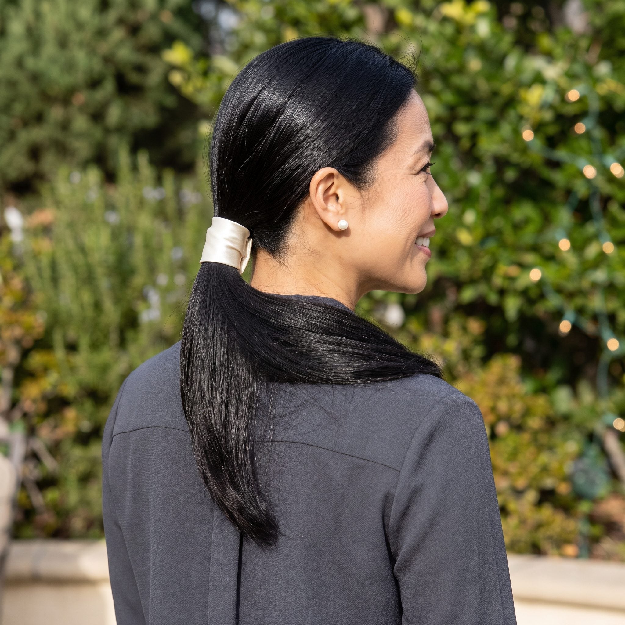 Sleek Low Ponytail With a Wide Satin Cuff